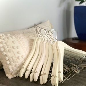 Ten for $10! Solid white wood hangers!